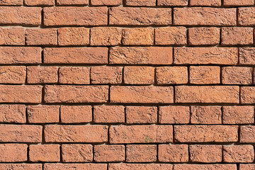 Old brick wall of red color close-up. Background