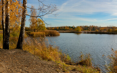 Bright sunny autumn day by the lake.