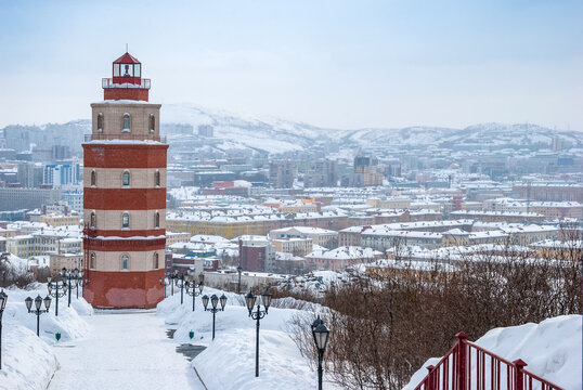 Murmansk City In Winter. Lighthouse - A Memorial To Sailors Who Died In Peacetime. Kola Peninsula.