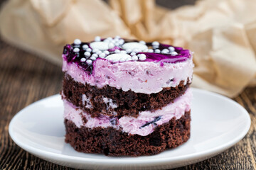 covered with blackberry jam chocolate cake with buttercream