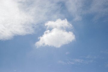 Stratocumulus clouds with a clear blue sky background in the midday. Types of clouds stock images.