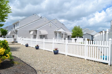 house with vinyl fence
