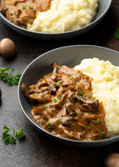 Beef Stroganoff with mushrooms and mashed potatoes.