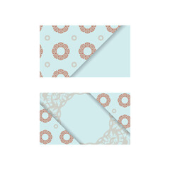 An aquamarine business card with vintage coral ornaments for your contacts.