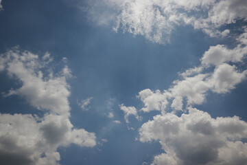 Obraz premium Stratocumulus clouds with a clear blue sky background in the midday. Types of clouds stock images.