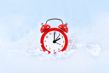 Winter time change for daylight saving in Europe on October 31st concept with red alarm clock...