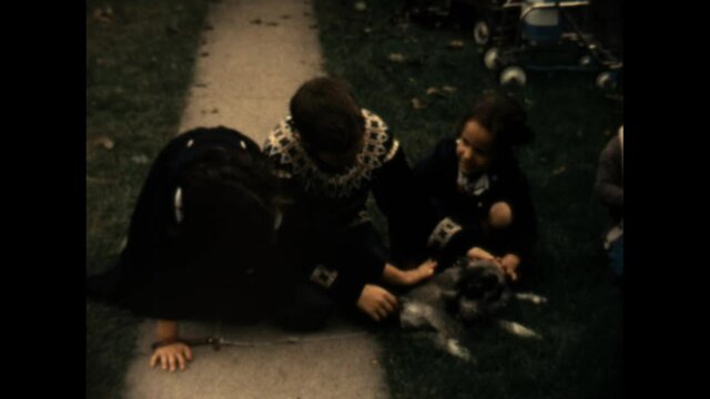 Petting Dog 1962 - Children pet a dog.  