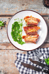 ribs fried grill pork or beef B-B-Q fat food spices spicy fresh meal snack on the table copy space food background  