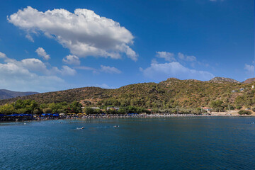 Naklejka premium DATCA,MUGLA,TURKEY 02 Eylül 2021 :View from Hayitbuku bay near Mesudiye,Datca.Datça is a port town in southwestern Turkey. It's situated on the narrow Datça Peninsula on the Aegean Sea