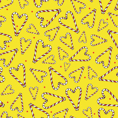 Vector Yellow Christmas candy cane hearts background pattern