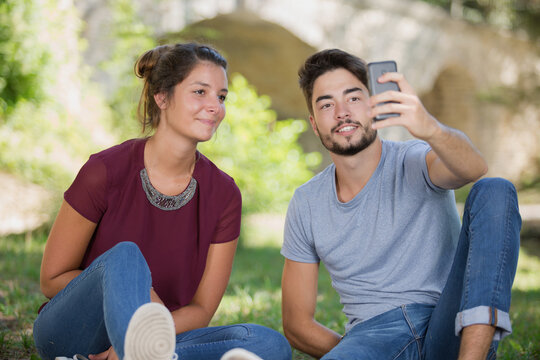 young couple selfie in the park