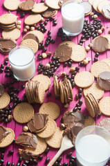 breakfast with chocolate cookies and a glass of milk