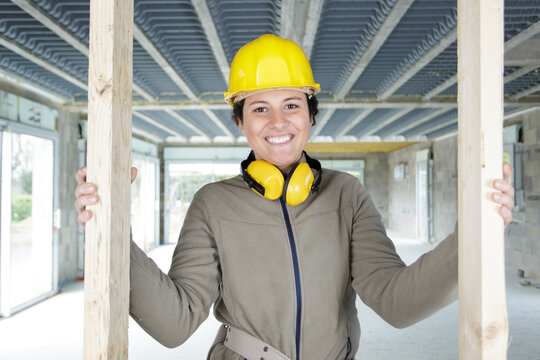 young female architecture student on construction site