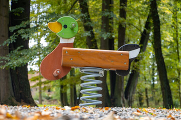 Wooden swing duck on the playground