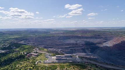 Fototapeta na wymiar Open Pit Iron Ore Quarry Industrial Landscape Aerial View