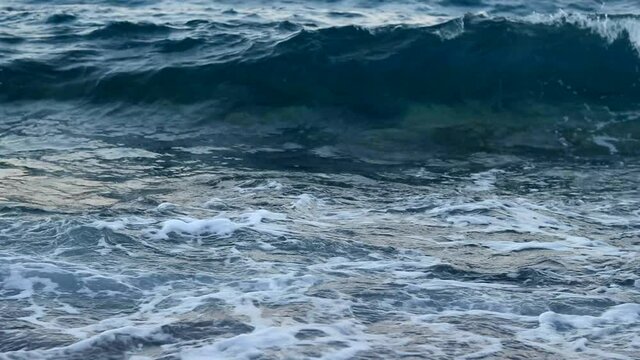 sea waves break, water explosion close-up.