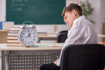 Male pupil in time management concept