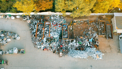 There is a lot of old rusty metal in the pile. Scrap metal sorting. Aerial photography