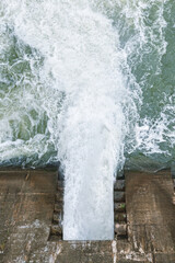 The dam was discharging water due to the large amount of water. Strong flow and high water pressure