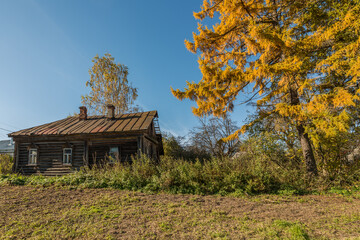 Old ruined wooden house in the village