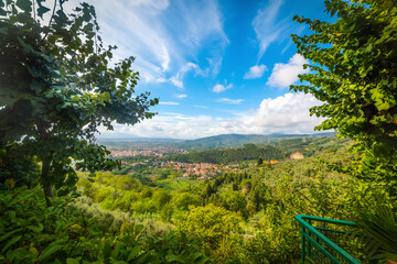 Montecatini in a green valley under a blue sky