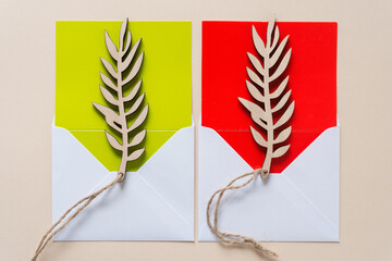 palm leaf ornament or tag on paper with envelope