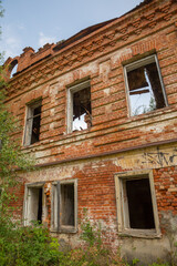 Fototapeta na wymiar Old ruined brick house. Russia