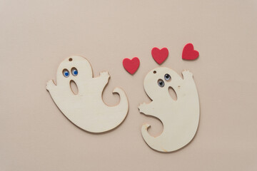 laser cut plywood ghost shapes on paper with hearts