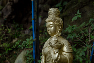 golden buddhism statue in temple