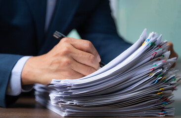 Businessman signing documen,  hand writing.
