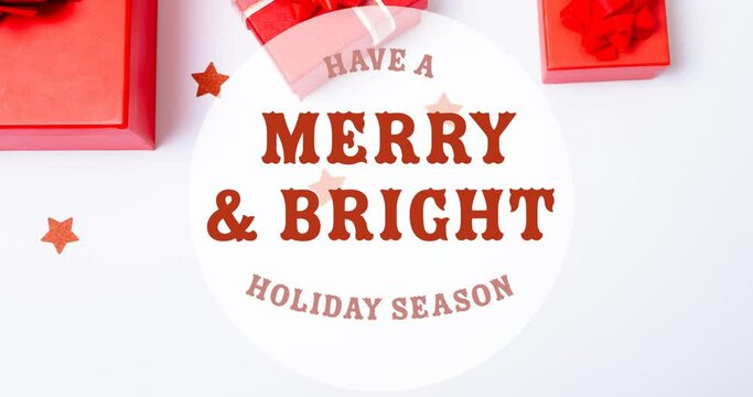 Animation of have a merry and bright christmas text over christmas decorations on white background