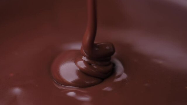 pouring melted chocolate slow motion