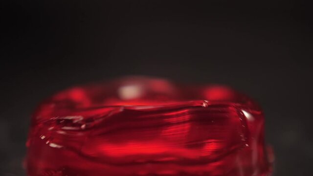 red gelatine jelly falling slow motion