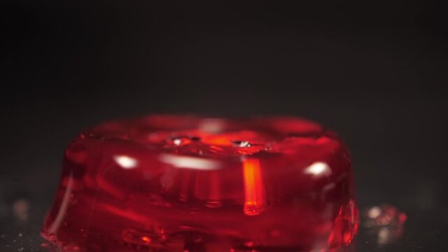 red gelatine jelly falling slow motion