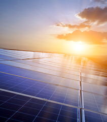olar cell panels on the rooftop of the buidling in countryside, sunset background. Soft and...