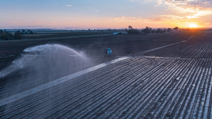 Water sprinklers on a ploughed field near Gin Gin, Queensland