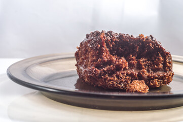 chocolate cake with chocolate filling, copy space, white background and selective focus