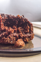 chocolate cake with chocolate filling, copy space, white background and selective focus