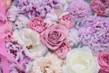 Flowers and ribbons floating on water