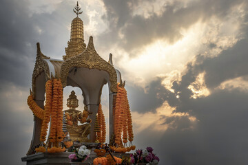 Bangkok, Thailand - 13 Dec 2019 : Golden statue of Phra Phrom or four-faced Buddha in beautiful...