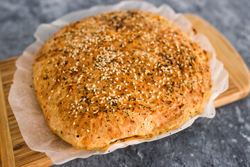 homemade bread with mixed seeds and herbs, simple ingredients concept