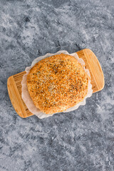 homemade bread with mixed seeds and herbs, simple ingredients concept