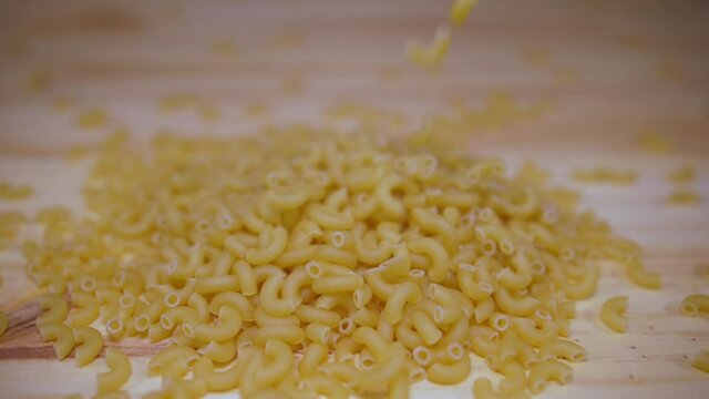 macaroni pasta falling down slow motion