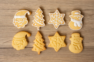 Merry Christmas with homemade cookies on wood table background. Xmas, party, holiday and happy New Year concept