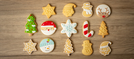 Merry Christmas with homemade cookies on wood table background. Xmas, party, holiday and happy New Year concept