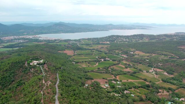 Aerial view of the Gassin village and fields from south of France