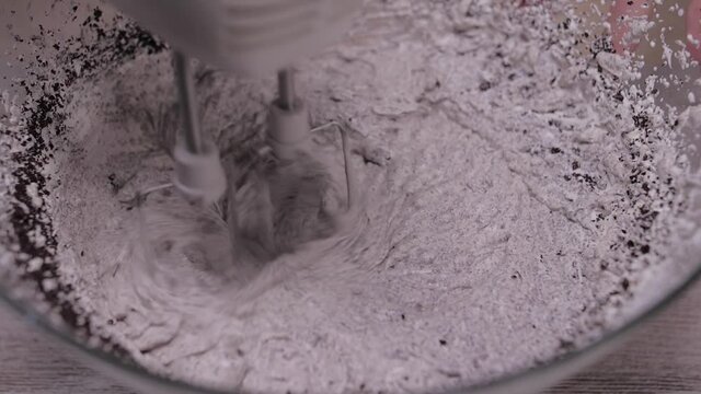 making  oreo cookie mousse with mixer slow motion