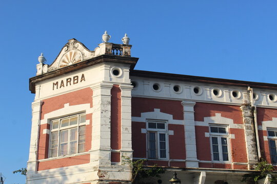 The red marba building seen from the side. Located in the old city of Semarang