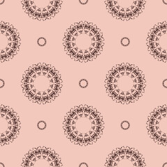 Pink vintage seamless texture with ornament. Design element. Decorative background. Exquisite floral wallpaper decor. Traditional decor on a pink background.