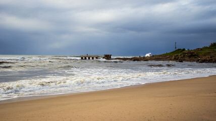 beach with a pier